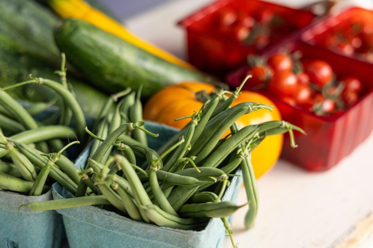 Freshly,Picked,Green,Beans,Are,Overflowing,From,Baskets,With,Other